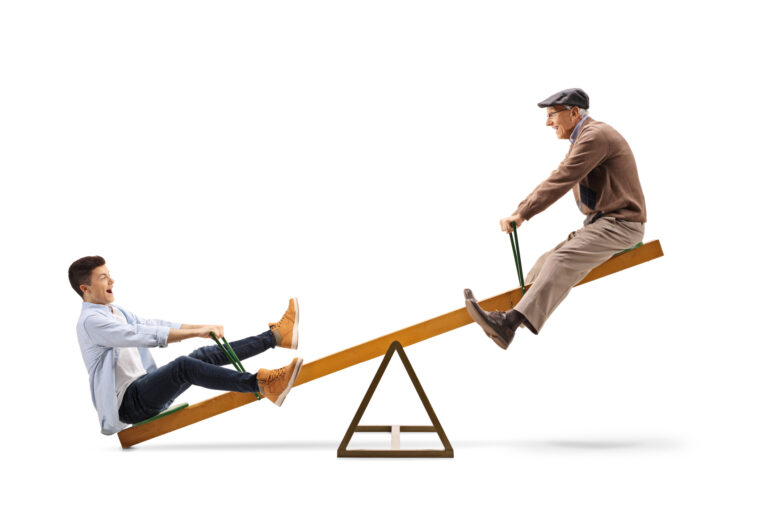 22 08 02 two people riding a seesaw gettyimages 1081951356