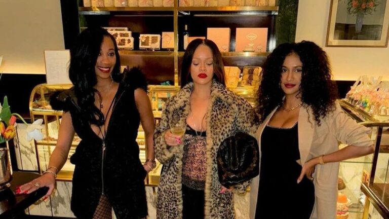 Rihanna Posed in a 1300 The Attico Lace Camisole with 1760 Black The Attico Snap Button Jeans 16