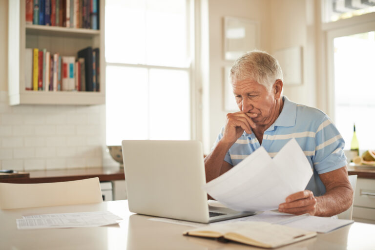 senior man laptop stressed gettyimages 629581450