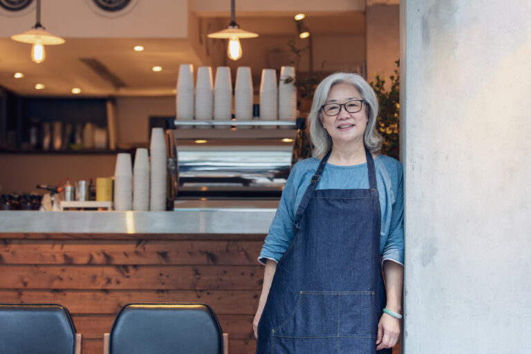 senior woman apron gettyimages 1149030738