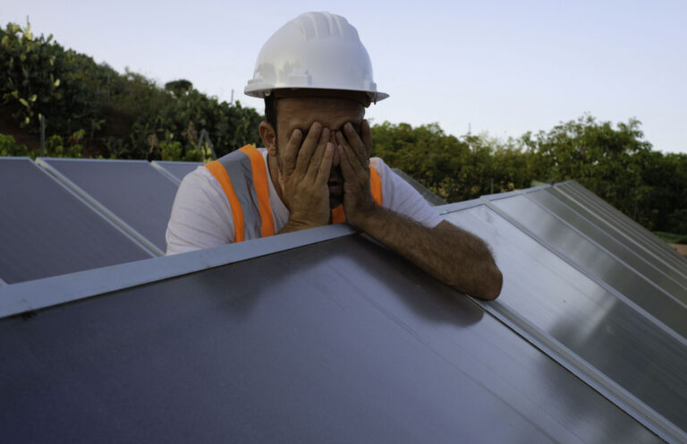 solar panel installation technician frustrated