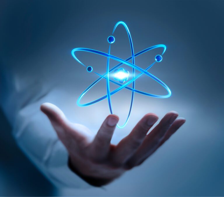 24 10 09 a hand holding a nuclear power symbol mf dload gettyimages 1369513916 910x800 446eb5d