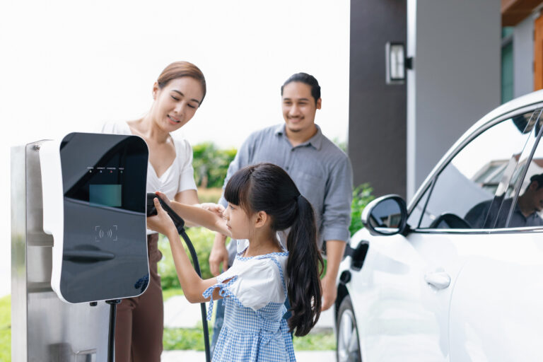 a family charges an ev