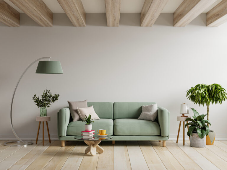 a green sofa in a living room home goods home furnishings