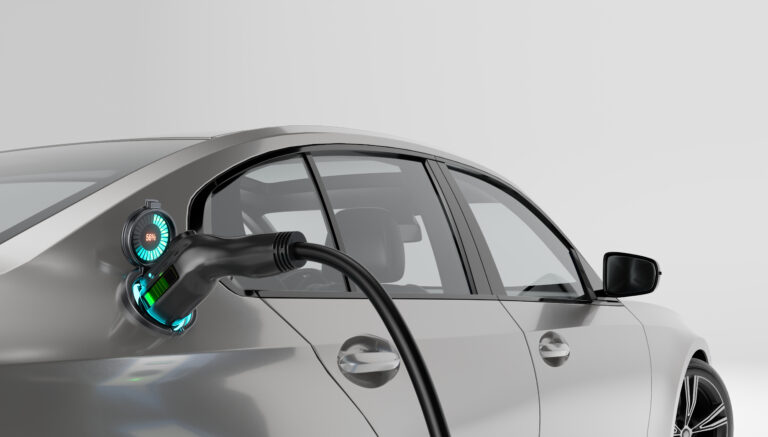 ev plugged in at charging station getty