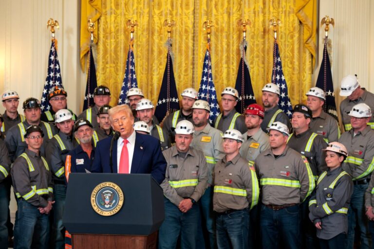 President Donald Trump speaks alongside coal and energy workers din the White House