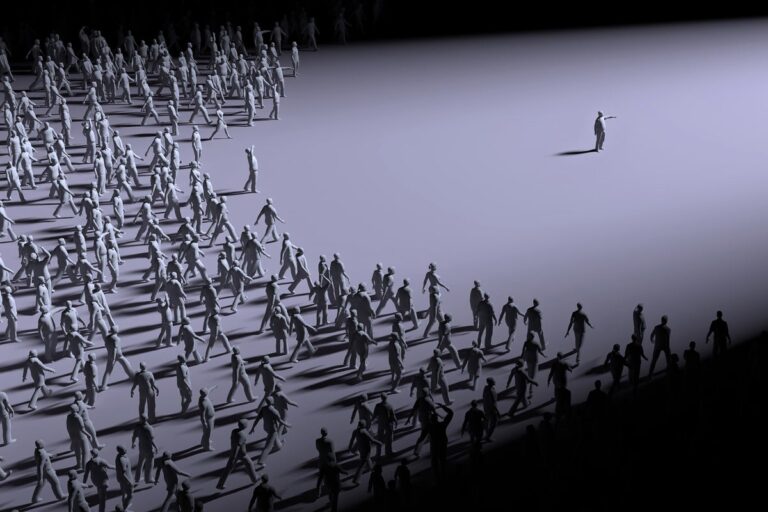 crowd of people following a leader figure
